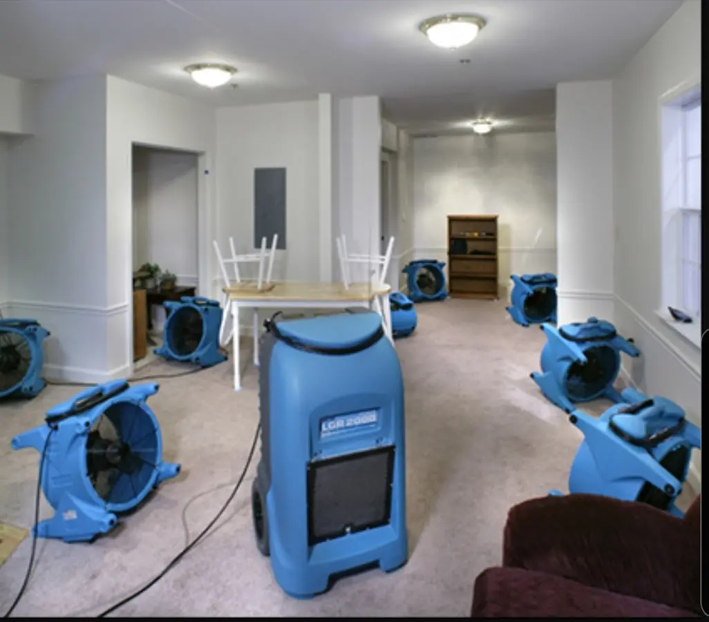 Air movers and dehumidifier setup for Water Damage Restoration in Clayton